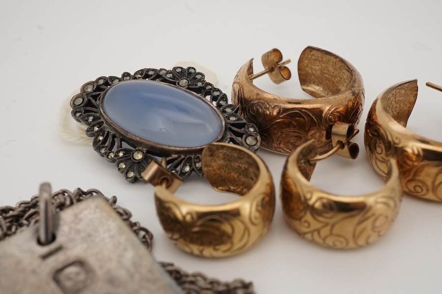 A pair of engraved 9ct gold hoop earrings, diameter 22mm, a similar smaller pair of 9ct gold, hoop earrings, gross 7 grams, together with a white metal, blue chalcedony and marcasite set brooch and a 1970's silver ingot